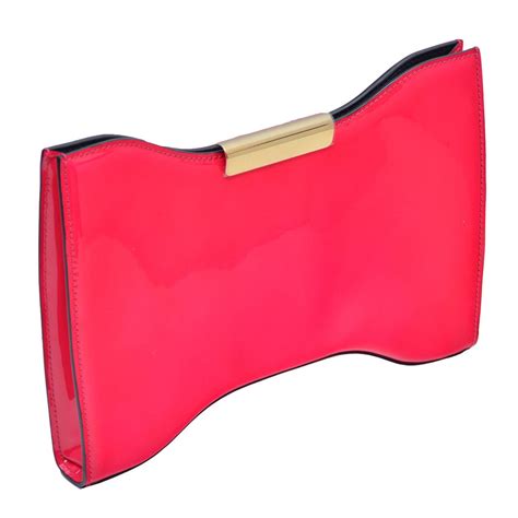 pink patent leather clutch purse.